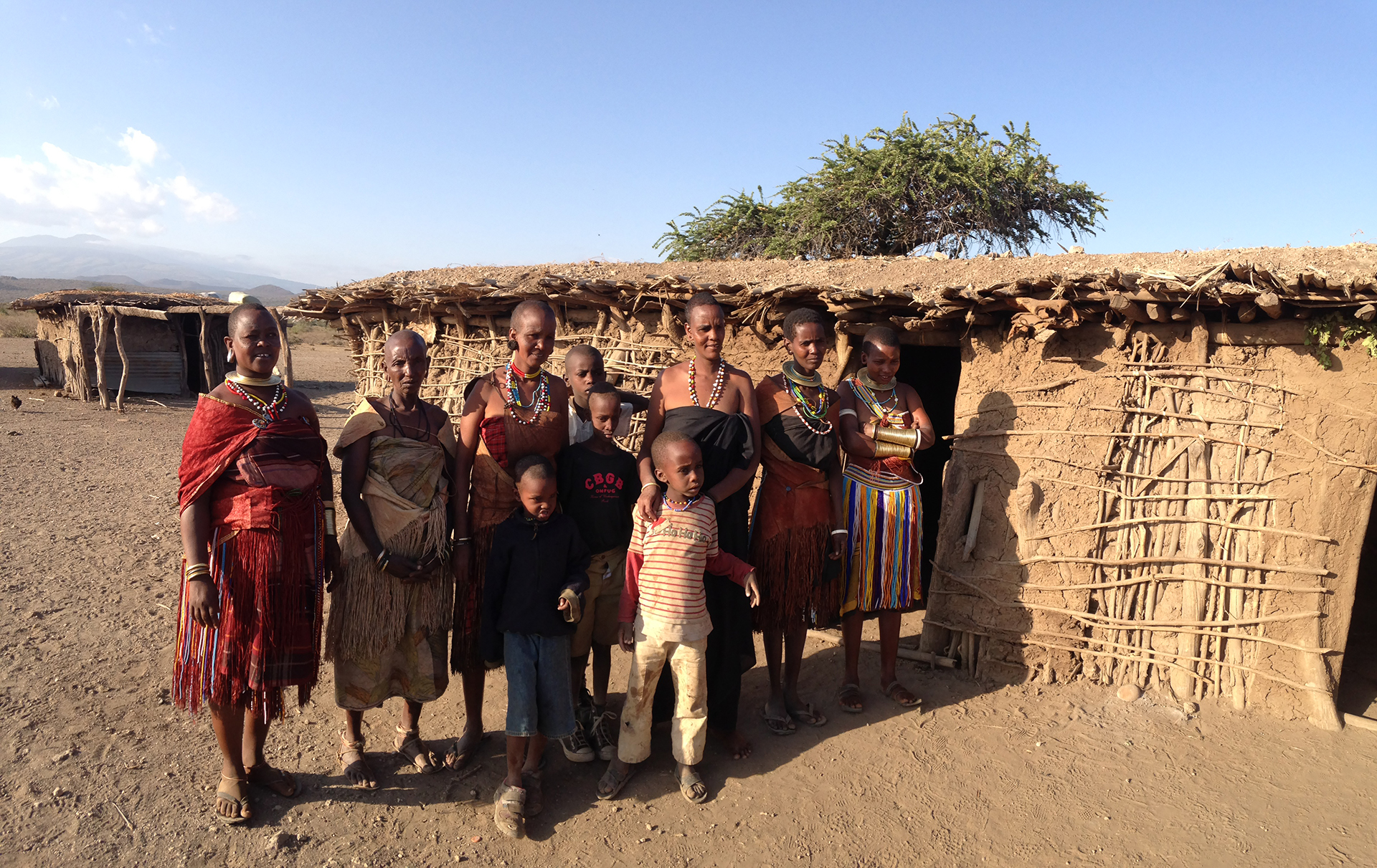 datoga people in front of their huts in tanzania