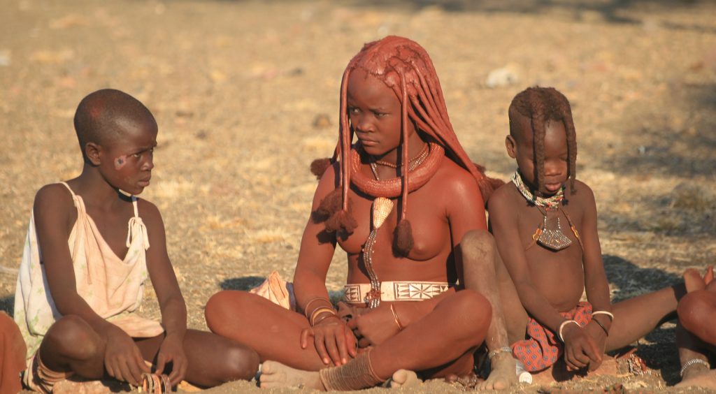 Himba girl and boys at the village