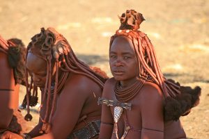 him women with red skin and beautiful hairstyle him namibia